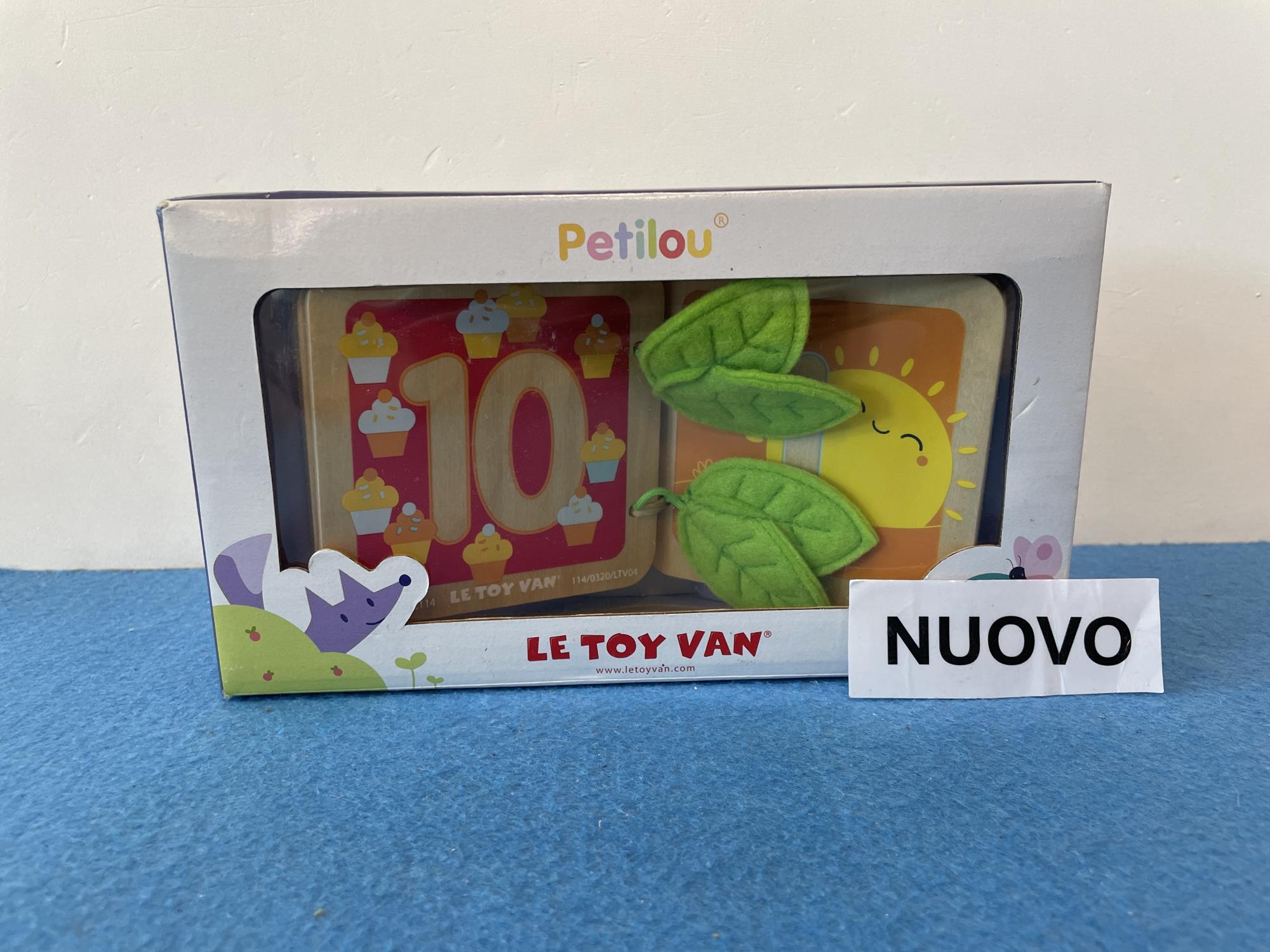 nuovo giovo libro legno e tessuto