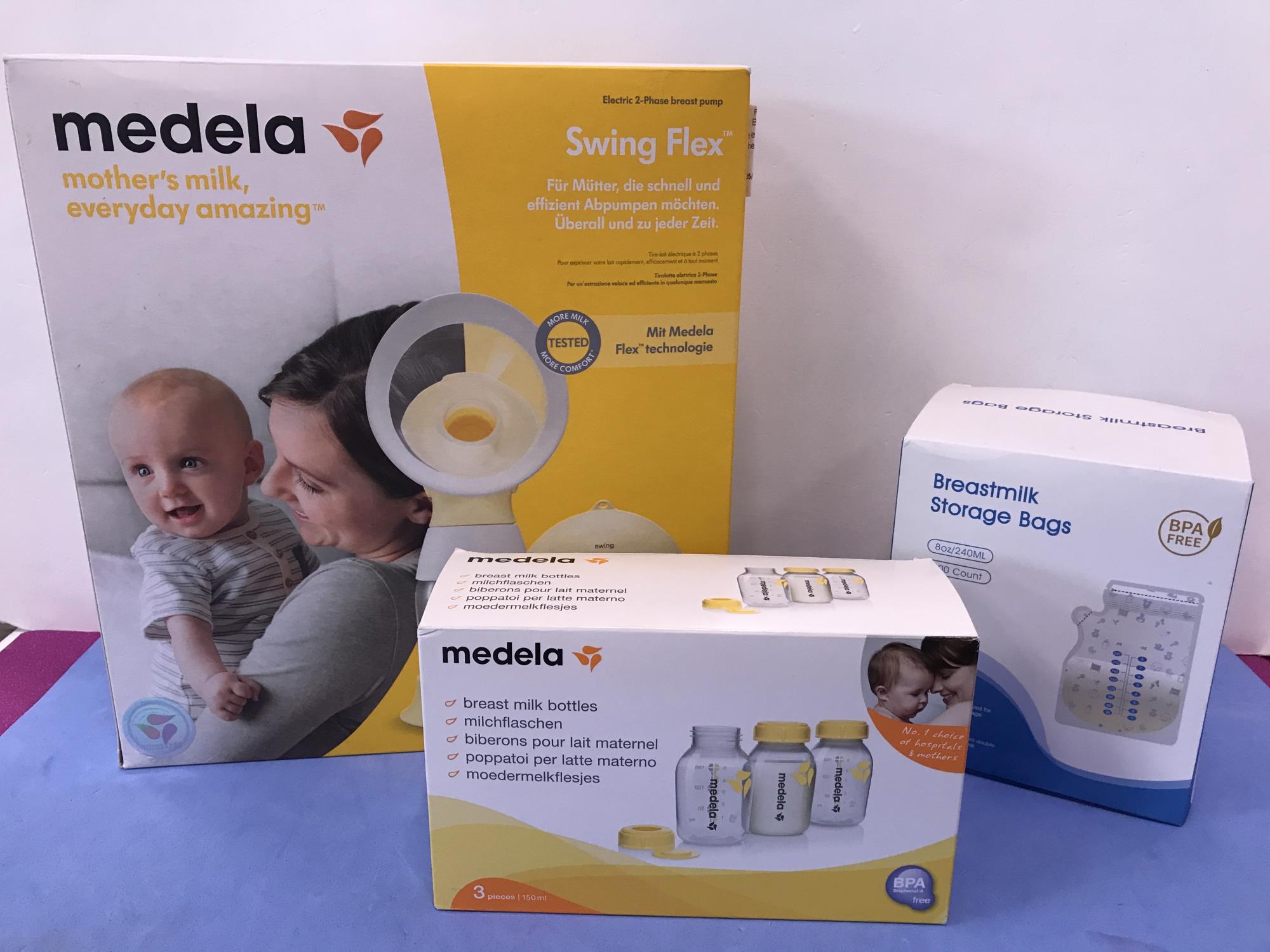 tiralatte elettrico medela con biberon e sacche raccoglilatte nuove